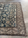 One end of floral garden design Persian Malayer rug.