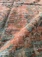 Botanical motif Lilihan rug with deep blue and dark green decorative borders