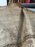 large neutral rug