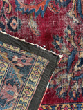 Underside of rug revealing wool weaving technique.