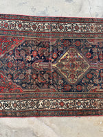 Antique Bibikabad runner showing classic Herati design woven with vegetable dyed wool and also showing where it was professional shortened.
