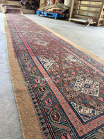 Vintage 1920s runner with multi-colored border accents.