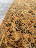 Border band of 2'8 x 20'8 golden 21 foot Persian runner with tightly woven wool, floral artwork, and beautiful directional sheen.
