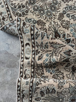 Designer-favorite antique runner with compound wash finish showing underside weave.
