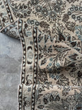 Designer-favorite antique runner with compound wash finish showing underside weave.