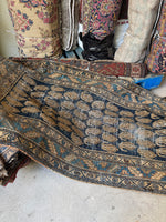 Vegetable-dyed vintage Persian runner in navy and tan tones.