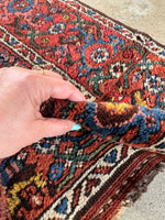 Low wool pile on handwoven Kurdish rug with vegetable-dyed wool.