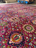 Mid-sized floral medallions in radiant colors on rug