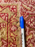 Authentic mid-20th century Turkish rug with some scattered wool loss.