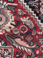 Spandrel detail with motifs in matching border style and colors