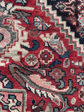 Spandrel detail with motifs in matching border style and colors