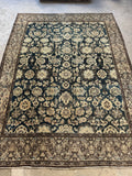 Large antique Malayer rug with floral design.