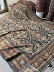 Back of rug showing fine handwoven construction and knotting