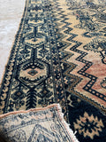 Antique Malayer rug close up showing weave and natural dye abrash.