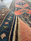 Malayer runner showcasing classic village weaving and geometric strength.