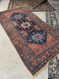 Antique Malayer rug handwoven with vegetable dyed wool.