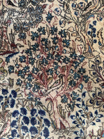 Botanical scene on vintage Persian rug with Birds of Paradise design.
