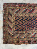 Long antique Kurdish runner measuring 3 foot 5 inches by 11 foot 4 inches.