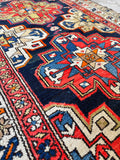 Vintage Persian rug with two central medallions.