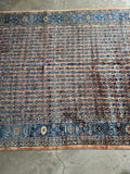 High-quality Sarouk rug featuring romantic tones and soft wool texture