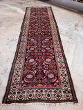 Narrow Persian runner under 3 feet overhead view highlighting the long, slender proportions ideal for tight hallways.