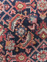 Close up of 5x8 Persian rug with water garden Mahi design.