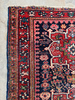 navy blue heriz rug
