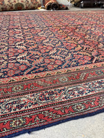 Persian wool rug over 16 feet long, ideal for hallways or dining areas.