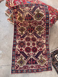 Antique Caucasian rug 2x3 featuring an edgy bone ivory field and French blue floral border.
