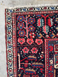 Large antique Persian Heriz rug. Vintage 1920s wool carpet with saturated vegetable dyes, full pile, and exceptional antique condition.