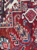 Antique Persian wool rug. Hand knotted Heriz carpet with bold medallion, full pile, rugged weave, and timeless tribal character.