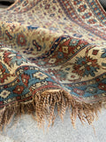 Vintage Caucasian Shirvan rug with crisp geometric forms and linear movement.