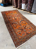 Full view of circa 1940 handwoven Persian rug.