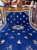 Antique Chinese Peking blue rug 13x19 laying flat showing full floral medallion pattern and golden butterfly border.