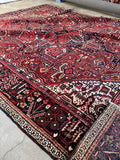 Antique Persian area rug. 1920s Heriz carpet with vivid vegetable-dyed wool, geometric artwork, and healthy full pile.