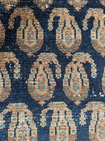 Close up view of Persian runner with vintage texture and rich color. contrast