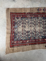 Detail of paisley motifs on an antique Persian Seraband runner.