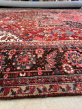 Oversized Persian carpet with geometric medallion and excellent antique condition.