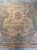 Antique Aubusson wall hanging or floor tapestry with soft watercolor-inspired tones.