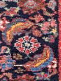 Authentic hand knotted Persian runner detailed shot of the Herati motif.