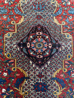 Detailed view of stained glass-style design in Bakhtiari rug.