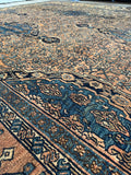 Vintage Persian rug with vegetable dyed wool and visible abrash throughout the field.