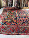 Partial view of antique Persian rug.