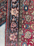 Antique Persian rug 4x6 size showing a detailed view of hand-knotted wool weaving and classic border designs.