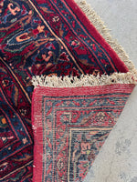 Underside view of Lilihan rug showcasing vibrant, naturally dyed wool and weave.