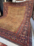 Palatial vintage Persian Mahal rug  with aged dyes, floppy handle, and a low pile.