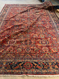 Handwoven wool rug showing intricate all-over design.