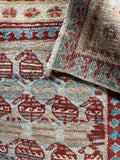 1920s Persian Mahal skinny runner with alternating warm and cool tones.