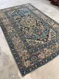 Antique Persian Malayer rug, 4'8 x 7'3, with navy and camel color palette.