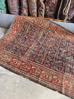 Persian rug handwoven in the 1920s.